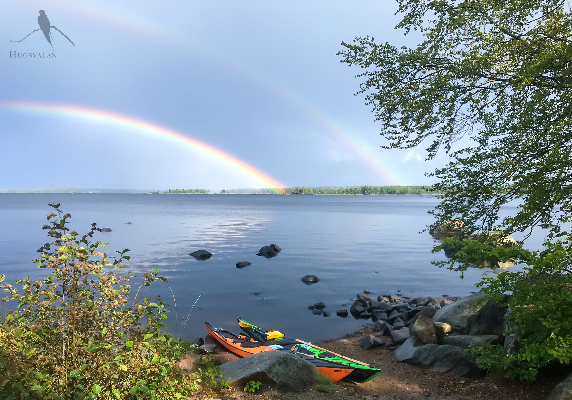 Regnbågen över sjön Åsnen i Småland